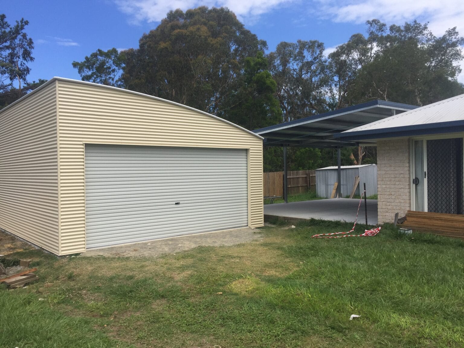 Curved Roof Cream garage and owning